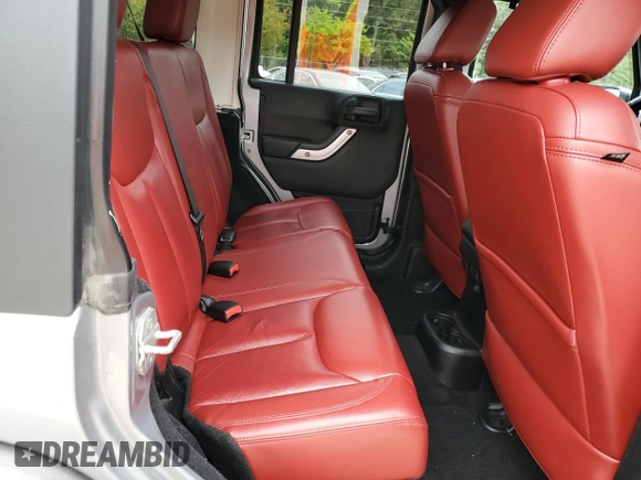 2013 Jeep Wrangler Unlimited Rubicon 10th Anniversary z VIN 1C4HJWFG3DL703331, wystawiony jako Copart lot #70823154 z przebiegiem 148 860 mil mil oraz Szkoda całkowita • Salvage title. Historia ofert i sprzedaży dostępna na DreamBid. Obrazek 10.