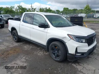 2023 Honda Ridgeline Black Edition with VIN 5FPYK3F88PB018969, listed as a IAAI auction lot 42264424 with 19,193 mi miles and . Bid and sale history available at DreamBid. Image 1.