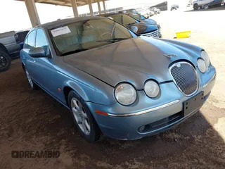 2005 Jaguar S-Type z VIN SAJWA01U75HN43915, wystawiony jako IAAI lot #42067675 z przebiegiem 173 221 mil mil oraz . Historia ofert i sprzedaży dostępna na DreamBid. Obrazek 1.