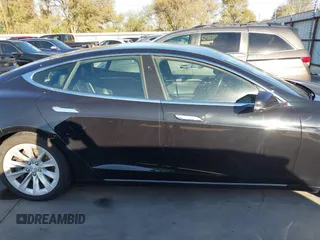 2017 Tesla Model S 60 with VIN 5YJSA1E19HF226094, listed as a IAAI auction lot 40931307 with 80,392 mi miles and . Bid and sale history available at DreamBid. Image 14.