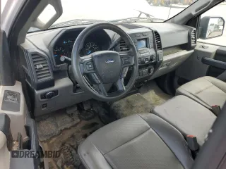 2020 Ford F-150 XL with VIN 1FTMF1CB3LKD51612, listed as a Copart auction lot 52724055 with 147,261 mi miles and Salvage title. Bid and sale history available at DreamBid. Image 8.