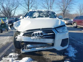 2017 Audi Q3 Premium with VIN WA1ECCFS9HR017842, listed as a IAAI auction lot 41400330 with 106,884 mi miles. Bid and sale history available at carsss.com. Image 12.