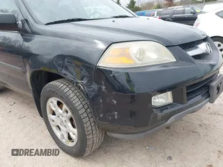 2004 Acura MDX Touring Pkg with VIN 2HNYD18694H551917, listed as a IAAI auction lot 42130100 with 207,699 mi miles. Bid and sale history available at carsss.com. Image 14.