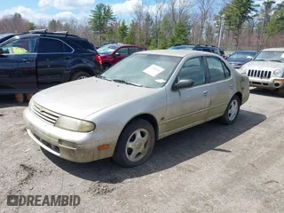1997 Nissan Altima XE with VIN 1N4BU31D8VT205299, listed as a IAAI auction lot 42081935 with 235,426 mi miles. Bid and sale history available at carsss.com. Image 2.