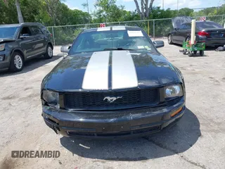 2007 Ford Mustang Deluxe с VIN 1ZVFT80N675242314, выставлен на аукционе IAAI как лот 42318323 с пробегом 171 017 миль миль и . История ставок и продаж доступна на DreamBid. Изображение 12.