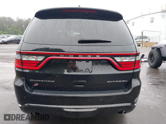 2023 Dodge Durango Citadel with VIN 1C4RDJEG1PC582304, listed as a IAAI auction lot 42528327 with 9,896 mi miles and . Bid and sale history available at DreamBid. Image 17.