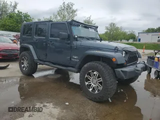2007 Jeep Wrangler Unlimited Sahara with VIN 1J4GB59177L226122, listed as a Copart auction lot 55529575 with 208,811 mi miles and Salvage title. Bid and sale history available at DreamBid. Image 4.