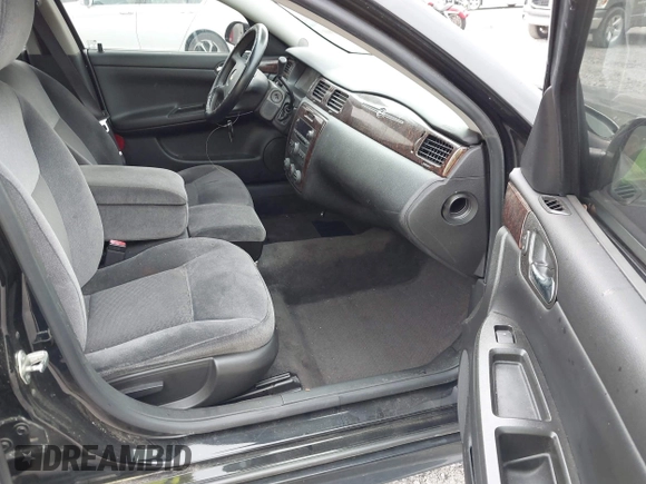 2013 Chevrolet Impala LS with VIN 2G1WF5E37D1255918, listed as a IAAI auction lot 42076395 with 118,131 mi miles and . Bid and sale history available at DreamBid. Image 5.