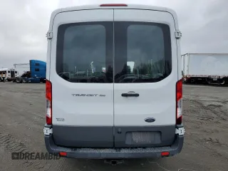 2015 Ford Transit Cargo with VIN 1FTYE1CM7FKA24477, listed as a Copart auction lot 86310214 with 54,098 mi miles and Salvage title. Bid and sale history available at DreamBid. Image 6.