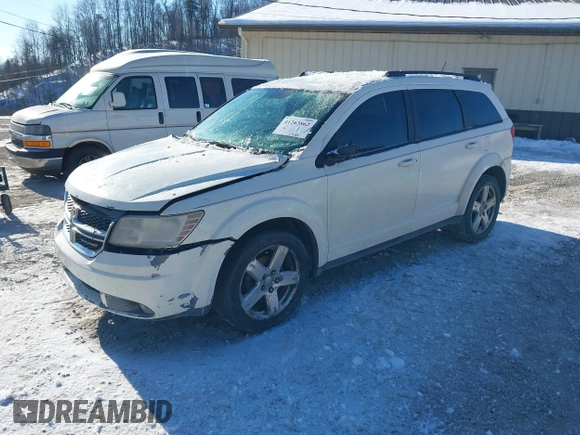 2016 Dodge Journey SE with VIN 3C4PDCAB6GT186547, listed as a IAAI auction lot 41263862 with 200,748 mi miles. Bid and sale history available at carsss.com. Image 2.
