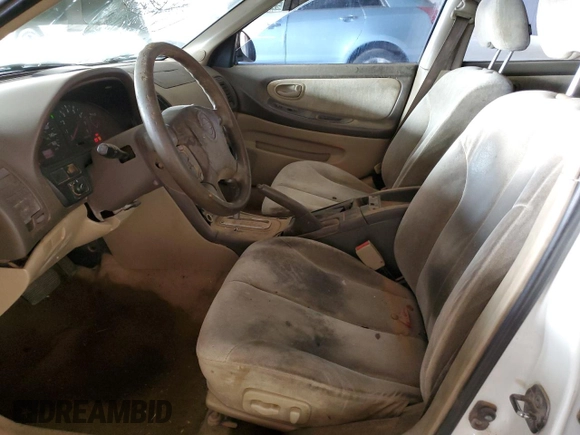 2001 Nissan Maxima GXE with VIN JN1CA31D41T809212, listed as a Copart auction lot 57845405 with 244,502 mi miles and Salvage title. Bid and sale history available at DreamBid. Image 7.