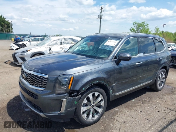 2020 Kia Telluride S with VIN 5XYP64HC7LG018450, listed as a IAAI auction lot 42072769 with 93,110 mi miles and . Bid and sale history available at DreamBid. Image 2.