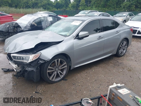 2020 Acura TLX w/Technology Pkg with VIN 19UUB3F49LA003325, listed as a IAAI auction lot 40046774 with 37,801 mi miles. Bid and sale history available at carsss.com. Image 2.