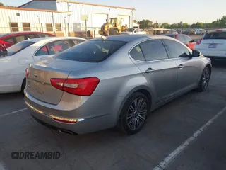 2014 Kia Cadenza Limited with VIN KNALN4D76E5143751, listed as a IAAI auction lot 42067722 with 197,660 mi miles. Bid and sale history available at carsss.com. Image 4.