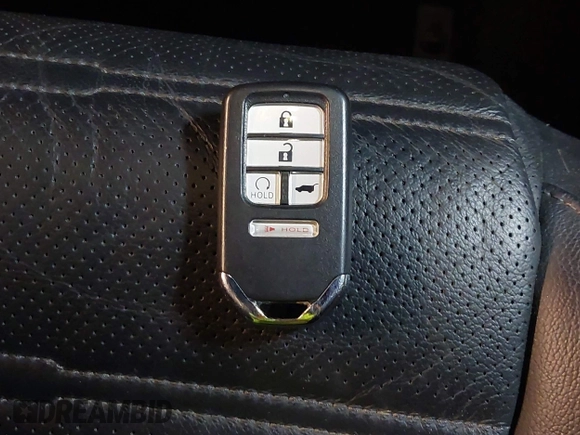 2021 Honda CR-V Touring with VIN 7FART6H98ME024238, listed as a IAAI auction lot 42341911 with 50,757 mi miles and . Bid and sale history available at DreamBid. Image 11.
