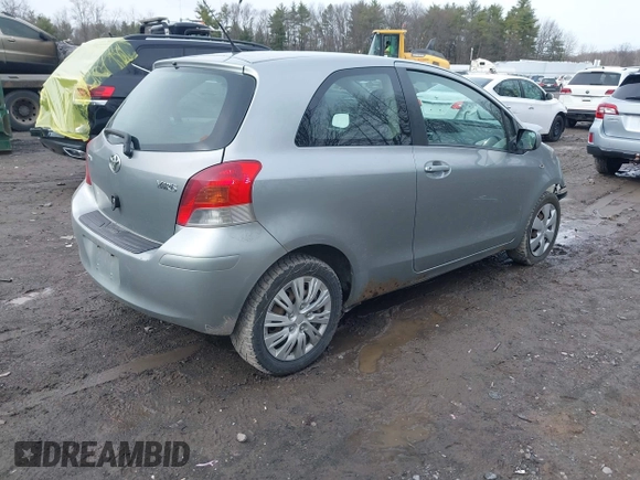 2009 Toyota Yaris with VIN JTDJT903095230292, listed as a IAAI auction lot 41958247 with 330,127 mi miles and . Bid and sale history available at DreamBid. Image 4.