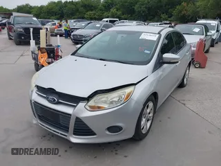 2013 Ford Focus SE z VIN 1FADP3F25DL189133, wystawiony jako IAAI lot #42438118 z przebiegiem 122 350 mil mil oraz . Historia ofert i sprzedaży dostępna na DreamBid. Obrazek 6.