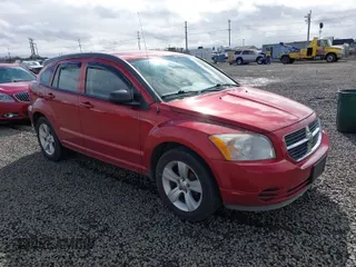 2010 Dodge Caliber SXT with VIN 1B3CB4HA8AD602460, listed as a IAAI auction lot 41804438 with Not Provided miles and . Bid and sale history available at DreamBid. Image 1.