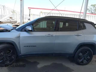 2019 Jeep Compass Latitude with VIN 3C4NJDBB4KT754484, listed as a IAAI auction lot 42324284 with 85,637 mi miles and . Bid and sale history available at DreamBid. Image 14.