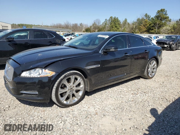 2012 Jaguar XJ with VIN SAJWA1CB5CLV29023, listed as a Copart auction lot 48300165 with 42,725 mi miles and Salvage title. Bid and sale history available at DreamBid. Image 1.