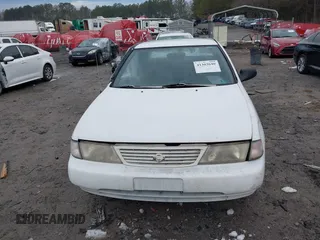 1996 Nissan Sentra XE z VIN 1N4AB41D0TC763104, wystawiony jako IAAI lot #41303640 z przebiegiem 307 682 mil mil oraz . Historia ofert i sprzedaży dostępna na DreamBid. Obrazek 12.