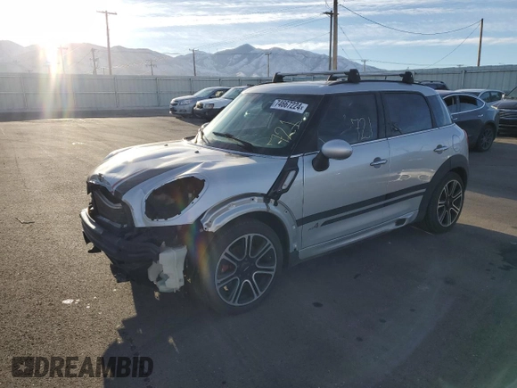 2015 MINI Countryman John Cooper Works with VIN WMWXD1C53FWS34815, listed as a Copart auction lot 74667224 with 94,971 mi miles and Salvage Title. Bid and sale history available at DreamBid. Image 1.