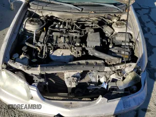 2002 Mazda 626 LX with VIN 1YVGF22C125297148, listed as a Copart auction lot 79130024 with 138,408 mi miles and Salvage Title. Bid and sale history available at carsss.com. Image 11.