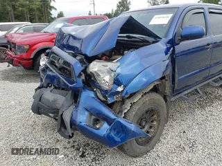 2015 Toyota Tacoma with VIN 3TMLU4EN1FM186747, listed as a IAAI auction lot 42493658 with 104,100 mi miles and . Bid and sale history available at DreamBid. Image 6.