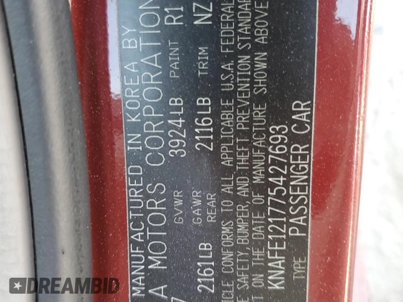 2007 Kia Spectra EX with VIN KNAFE121775427693, listed as a Copart auction lot 76727994 with 100,197 mi miles and Salvage Title. Bid and sale history available at carsss.com. Image 12.