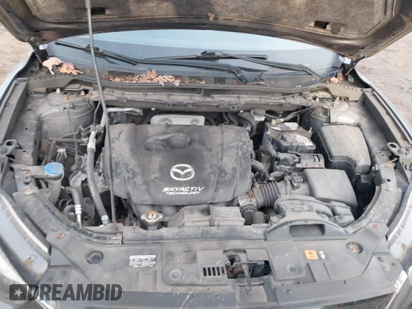 2015 Mazda CX-5 Grand Touring with VIN JM3KE4DY5F0470445, listed as a IAAI auction lot 41236468 with 87,845 mi miles. Bid and sale history available at carsss.com. Image 10.
