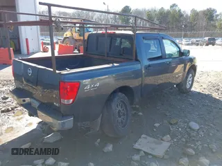 2005 Nissan Titan SE with VIN 1N6AA07BX5N502188, listed as a IAAI auction lot 41458002 with 207,154 mi miles. Bid and sale history available at carsss.com. Image 4.