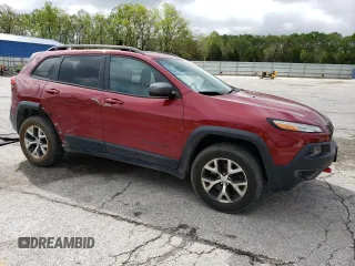 2014 Jeep Cherokee Trailhawk z VIN 1C4PJMBS2EW100476, wystawiony jako Copart lot #55130035 z przebiegiem 136 943 mil mil oraz Szkoda całkowita • Salvage title. Historia ofert i sprzedaży dostępna na DreamBid. Obrazek 4.