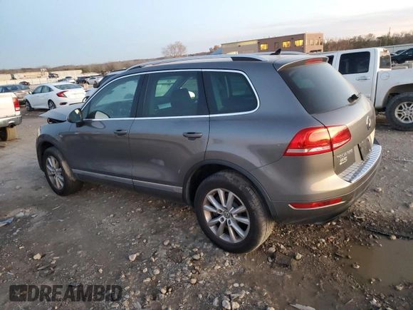 2013 Volkswagen Touareg Lux with VIN WVGEF9BP9DD008935, listed as a Copart auction lot 79859394 with Not Provided miles and Salvage Title. Bid and sale history available at DreamBid. Image 2.