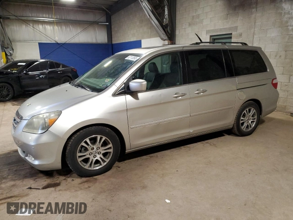 2007 Honda Odyssey Touring z VIN 5FNRL38887B102328, wystawiony jako Copart lot #52113595 z przebiegiem 105 394 mil mil oraz Szkoda całkowita • Salvage title. Historia ofert i sprzedaży dostępna na DreamBid. Obrazek 1.