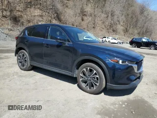 2022 Mazda CX-5 2.5 S Premium Plus Package with VIN JM3KFBEM6N0574048, listed as a Copart auction lot 52000625 with 21,039 mi miles and Salvage Title. Bid and sale history available at carsss.com. Image 4.