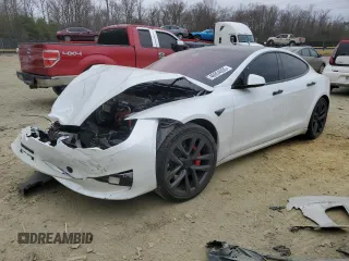2024 Tesla Model S Plaid z VIN 5YJSA1E62RF539887, wystawiony jako Copart lot #46954005 z przebiegiem Nie podano mil oraz Szkoda całkowita • Salvage title. Historia ofert i sprzedaży dostępna na DreamBid. Obrazek 1.