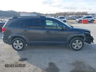 2014 Dodge Journey SE with VIN 3C4PDCAB0ET283756, listed as a IAAI auction lot 41490472 with 122,695 mi miles. Bid and sale history available at carsss.com. Image 14.