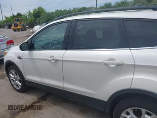 2013 Ford Escape SEL with VIN 1FMCU9H90DUC52981, listed as a IAAI auction lot 42506500 with 74,212 mi miles and . Bid and sale history available at DreamBid. Image 14.