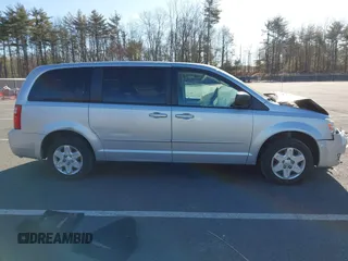 2010 Dodge Grand Caravan SE with VIN 2D4RN4DE2AR489971, listed as a IAAI auction lot 41895646 with 58,463 mi miles and . Bid and sale history available at DreamBid. Image 13.