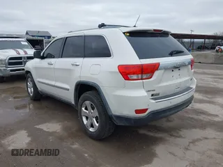 2012 Jeep Grand Cherokee Limited with VIN 1C4RJEBG4CC229571, listed as a IAAI auction lot 41565669 with 221,268 mi miles. Bid and sale history available at carsss.com. Image 3.