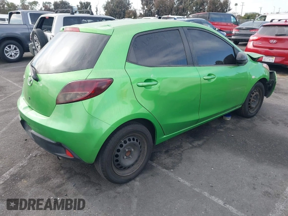 2012 Mazda 2 Sport with VIN JM1DE1KZ4C0140559, listed as a IAAI auction lot 41265959 with 139,364 mi miles and . Bid and sale history available at DreamBid. Image 4.
