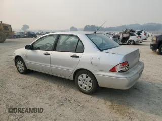 2002 Mitsubishi Lancer ES with VIN JA3AJ26E22U045919, listed as a Copart auction lot 63852225 with 184,071 mi miles and Salvage title. Bid and sale history available at DreamBid. Image 2.