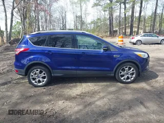 2014 Ford Escape Titanium with VIN 1FMCU9J94EUC38996, listed as a IAAI auction lot 41952267 with 211,375 mi miles. Bid and sale history available at carsss.com. Image 13.