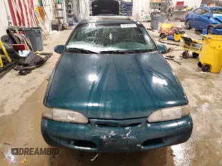 1995 Ford Thunderbird LX with VIN 1FALP62W8SH205542, listed as a Copart auction lot 47741815 with 128,401 mi miles and Clean Title. Bid and sale history available at DreamBid. Image 5.