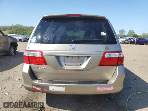 2006 Honda Odyssey EX-L z VIN 5FNRL38726B425098, wystawiony jako Copart lot #56143585 z przebiegiem 153 137 mil mil oraz Szkoda całkowita • Salvage title. Historia ofert i sprzedaży dostępna na DreamBid. Obrazek 6.