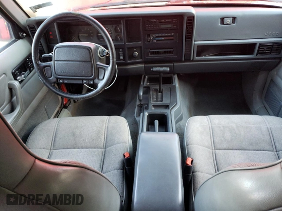 1996 Jeep Cherokee Sport with VIN 1J4FJ68S8TL285995, listed as a Copart auction lot 73333574 with 187,429 mi miles and Salvage Title. Bid and sale history available at carsss.com. Image 8.