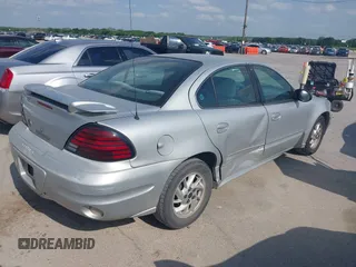 2003 Pontiac Grand Am SE1 with VIN 1G2NF52F03C278763, listed as a IAAI auction lot 42058886 with 226,926 mi miles. Bid and sale history available at carsss.com. Image 4.