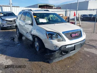 2010 GMC Acadia SLT1 with VIN 1GKLVMED0AJ167282, listed as a IAAI auction lot 41227299 with 121,293 mi miles. Bid and sale history available at carsss.com. Image 1.