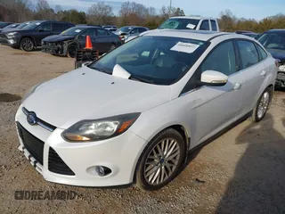 2013 Ford Focus Titanium with VIN 1FADP3J22DL167324, listed as a IAAI auction lot 41616927 with 127,259 mi miles and . Bid and sale history available at carsss.com. Image 17.
