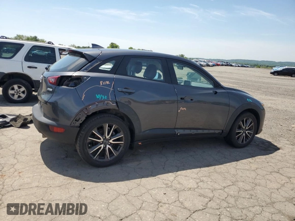2017 Mazda CX-3 Touring z VIN JM1DKFC76H0149368, wystawiony jako Copart lot #55747305 z przebiegiem 47 946 mil mil oraz Szkoda całkowita • Salvage title. Historia ofert i sprzedaży dostępna na DreamBid. Obrazek 3.